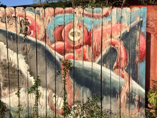 Mural of giant octopus vs shark